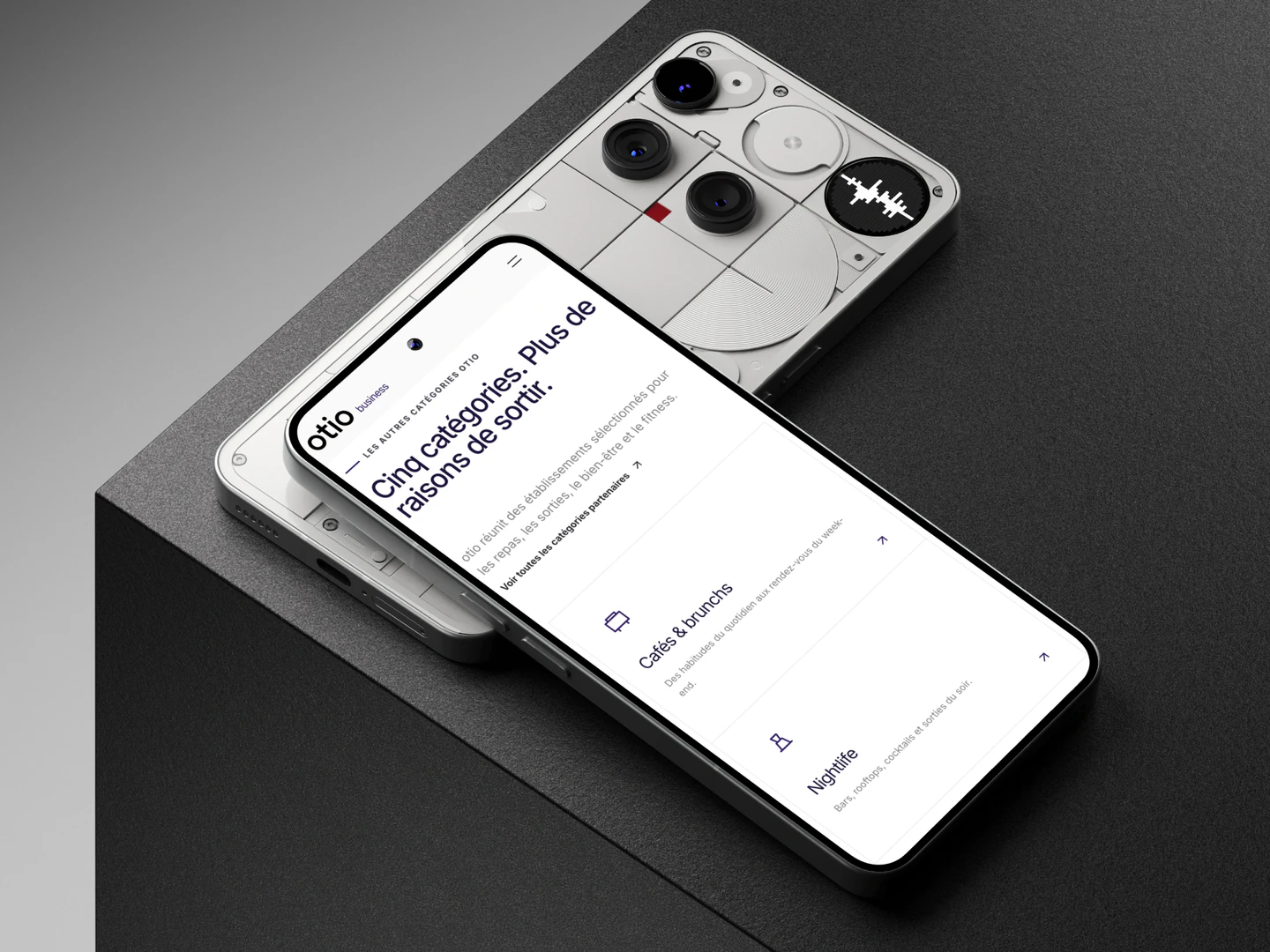 Otio membership categories displayed on a phone on a gray plinth