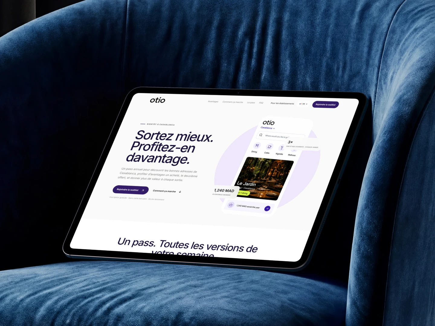 Otio homepage displayed on a tablet on a blue chair