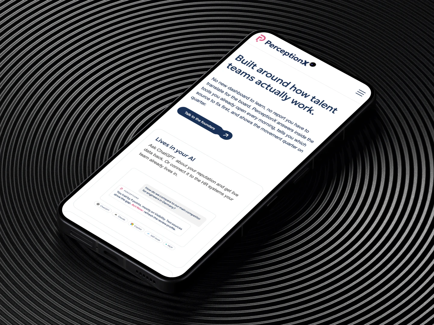 PerceptionX mobile features page on a phone over a circular textured surface