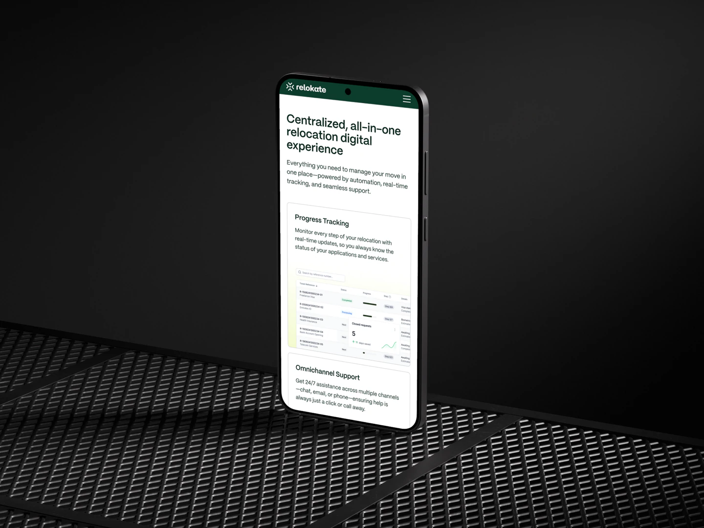 Relokate mobile relocation platform overview on a phone standing on a metal surface