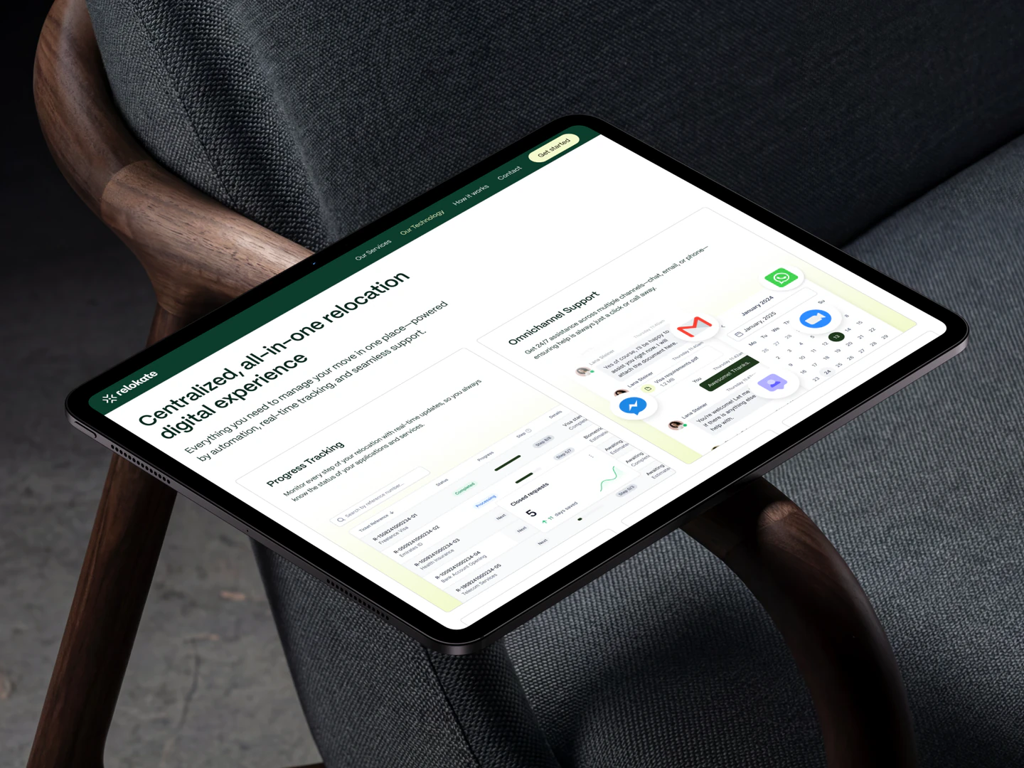 Relokate digital relocation platform on a tablet resting on an upholstered chair