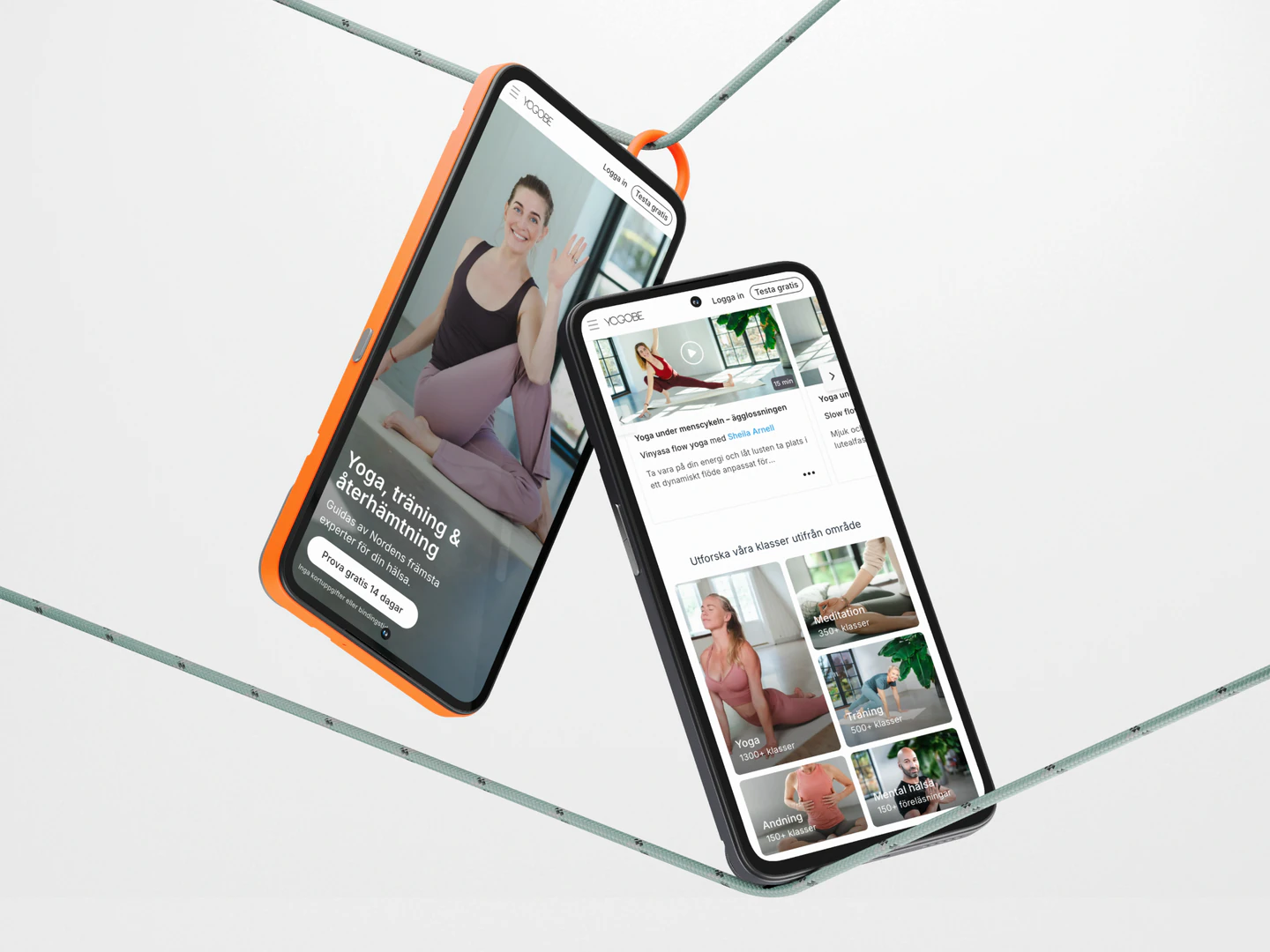 Yogobe mobile homepage and video library on two suspended phones